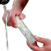 Water Testing Hands holding a small bottle of water being tested